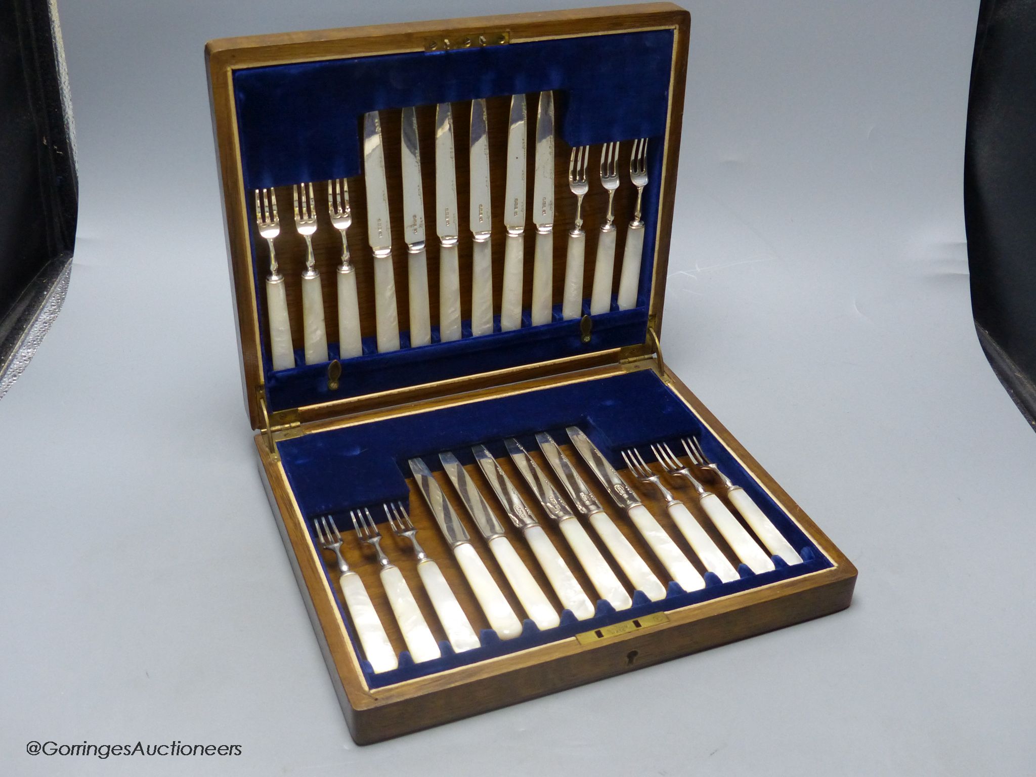 A cased set of George V mother of pearl handled silver dessert eaters, Frank Cobb & Co Ltd, Sheffield, 1927